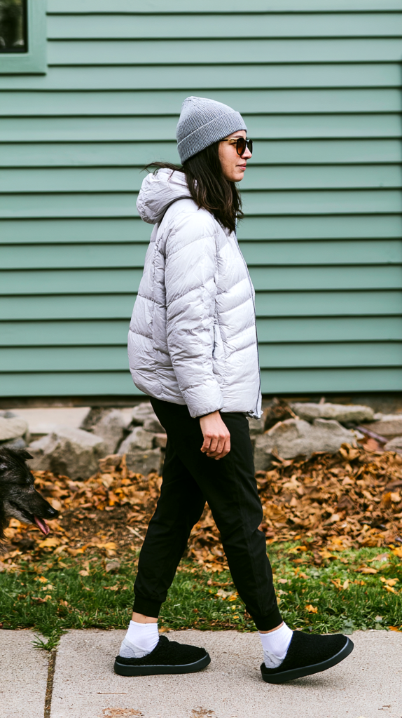 Puffer jacket, beanie and slippers yoga pants outfit for a cool-weather dog walk