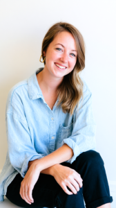 Harper Lane, lead author at Vlarelie, wearing a denim shirt in Austin Texas